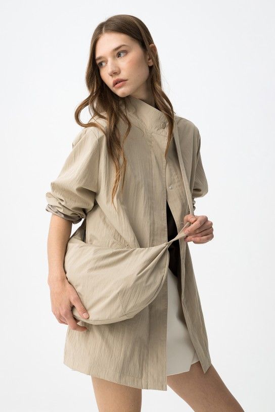 Parca beige con bolso Tiffosi